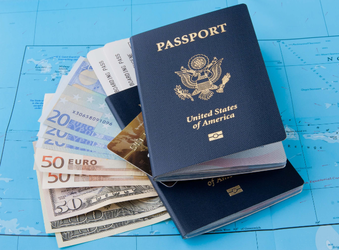 an image showing passports and money for travel and tours