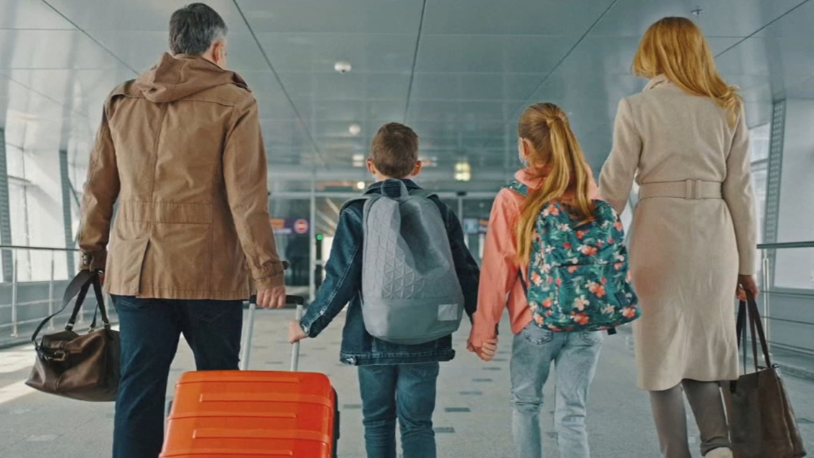 a family of four people going for a holiday showing the best travel experience